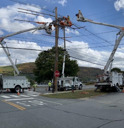 Overhead power line construction and maintenance
